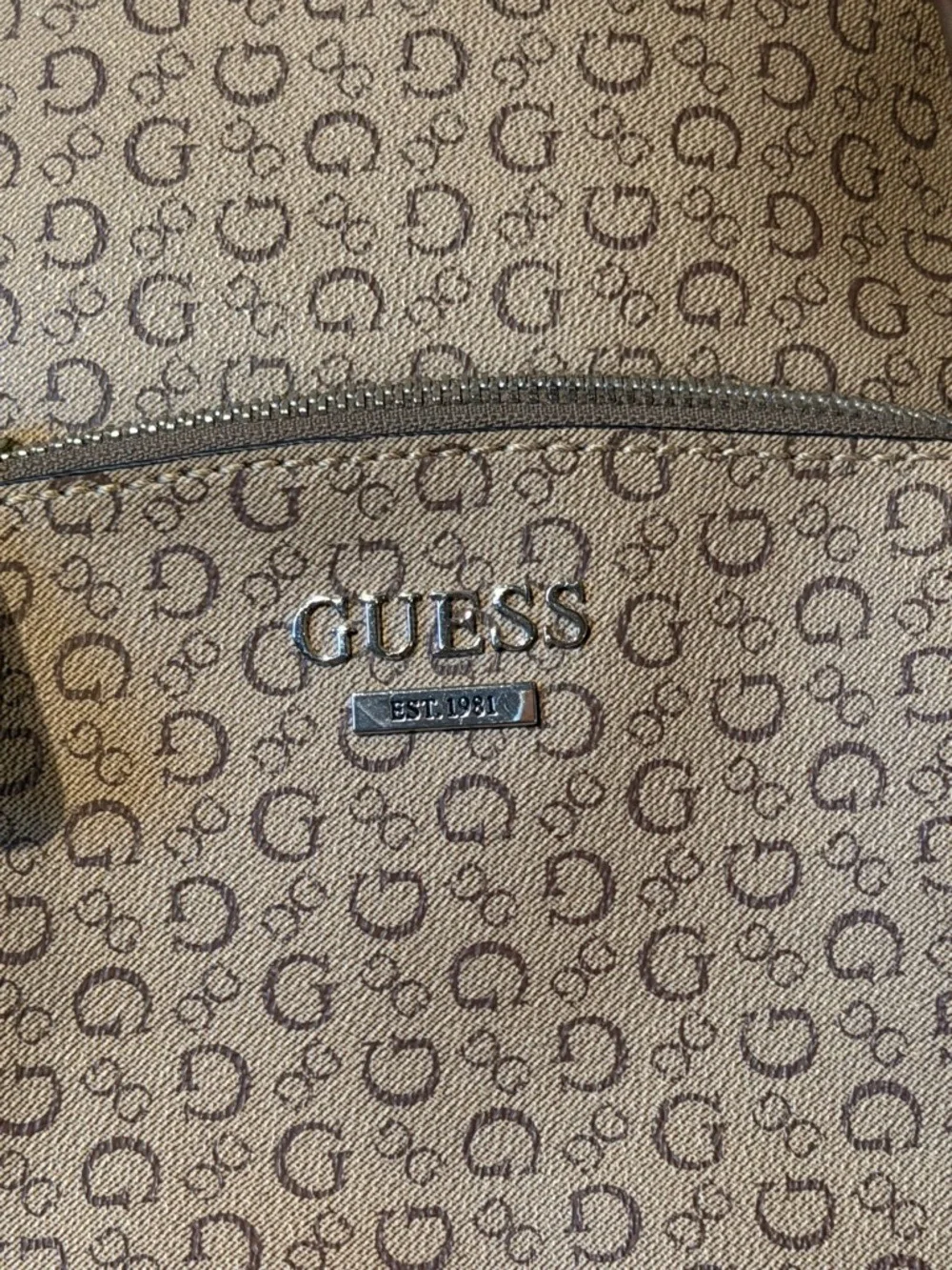Guess Tan Monogram Mini Backpack